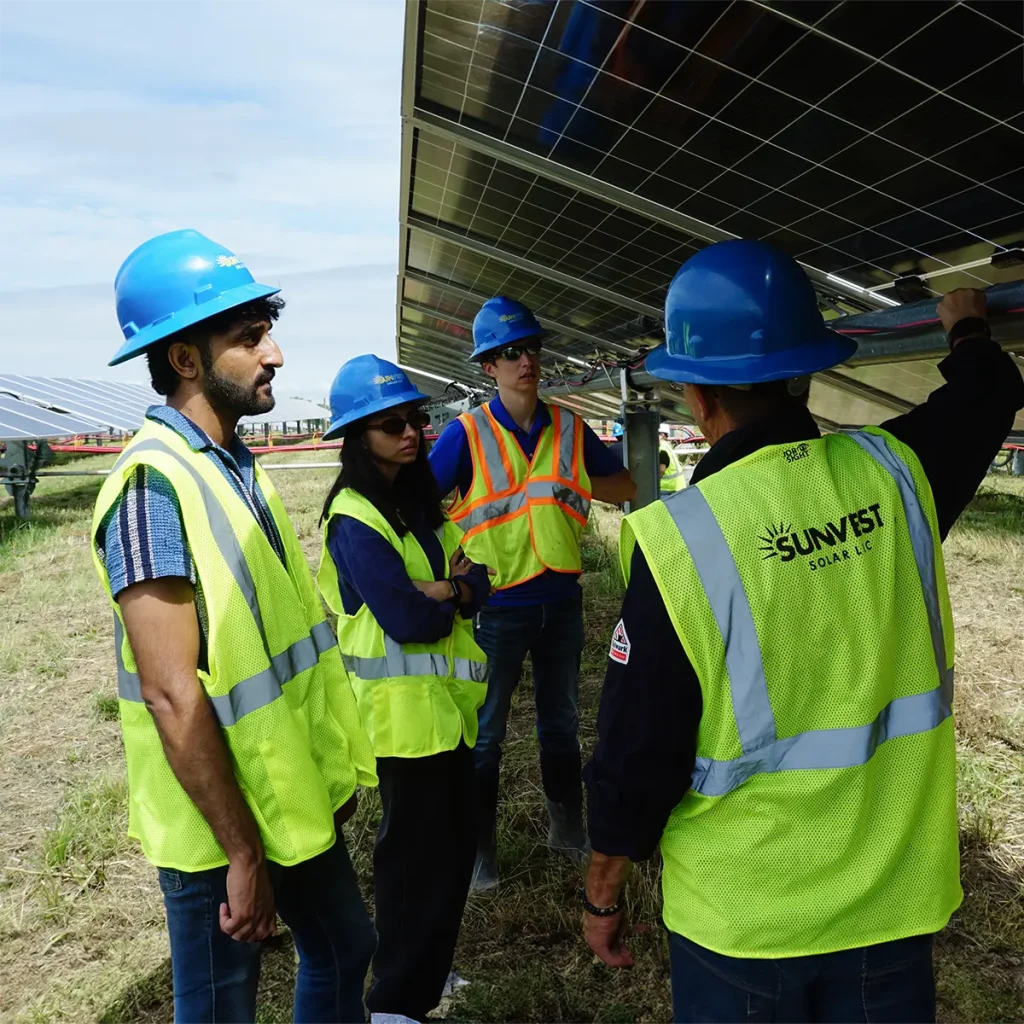 SunVest Employees working on a solar panel